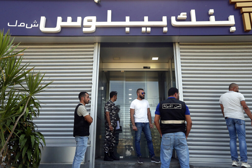 Depositors storm 4 Lebanese banks, demanding their own money News